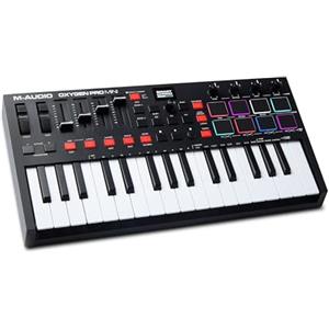 M-Audio Oxygen Pro Mini - Tastiera MIDI controller USB a 32 tasti con pad Beat, manopole, tasti e fader assegnabili via MIDI e suite software inclusa