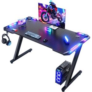 Devoko 120 x 60cm Scrivania Gaming LED, Tavolo Gaming Ergonomica, Scrivania per Computer con Porta Bicchiere e Ganci per Cuffie, Postazione con Piano del Tavolo in Fibra di Carbonio, Nero